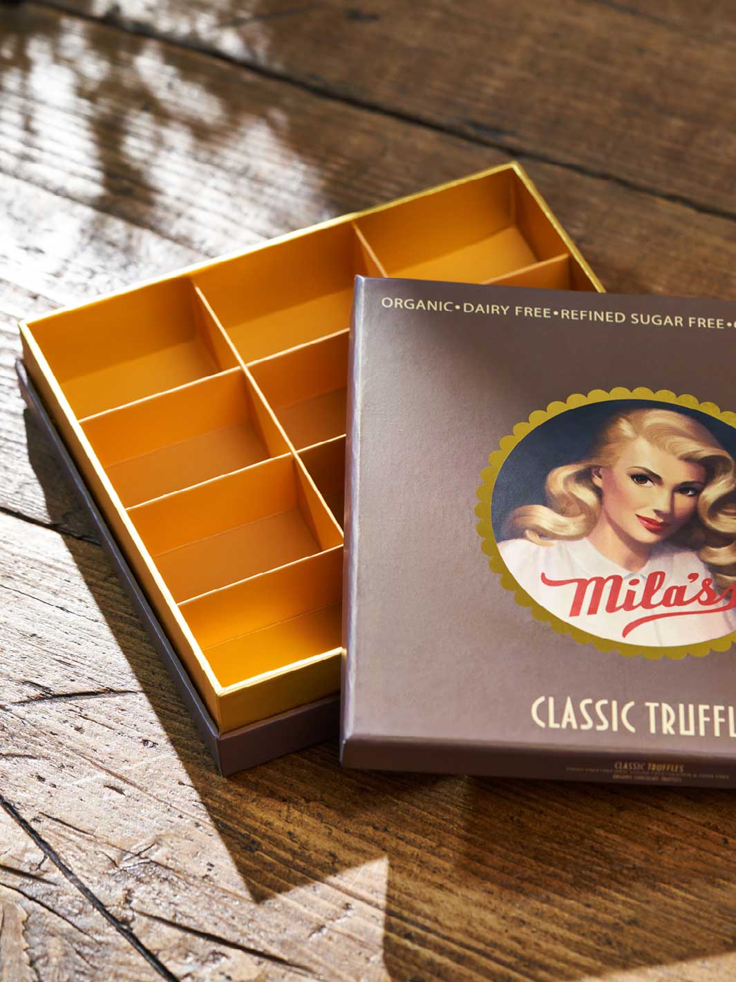 Three-piece shoulder cardboard box for individual items. 